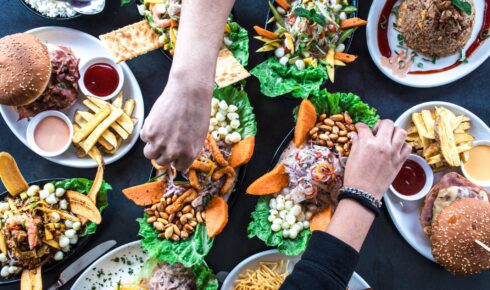 Overhead view of a group of people celebrating and eating in a Peruvian restaurant Overhead view of a group of people celebrating and eating in a Peruvian restaurant